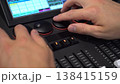 Hands of man turning shuttles on lighting mixer close up 4k 138415159