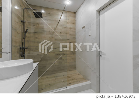 Modern Bathroom Interior with Walk-in Shower and White Invisible Door Modern Bathroom Interior with Walk-in Shower and White Invisible Door 138416975