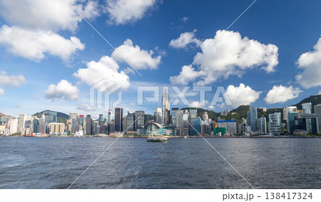 Panoramic view of Hong Kong, Victoria Harbour on a sunny day Panoramic view of Hong Kong, Victoria Harbour on a sunny day 138417324