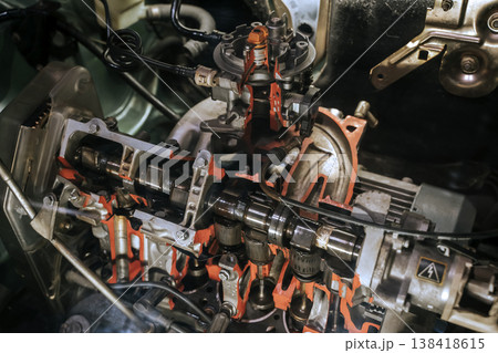 Car Engine Cutaway Showing Internal Combustion Components Close Up 138418615