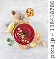 Beetroot hummus with parsley and olive oil in plate on a gray background, top view. Copy space. Arabic, Turkish cuisine. 138418766