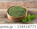 Dried mint leaves on rustic wooden background. Natural herbal ingredient for tea, seasoning. 138418773