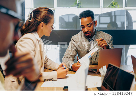 Mentor Aids Review. Experienced Mentor Supports Colleague Through Review And Feedback Session Mentor Aids Review. Experienced Mentor Supports Colleague Through Review And Feedback Session 138419247