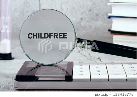 Lens on childfree, encircled by planning tools: calculator, hourglass, books. Represents deep life planning Lens on childfree, encircled by planning tools: calculator, hourglass, books. Represents deep life planning 138419779