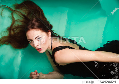 Sexy seductive woman in water. Sexy seductive woman in water. 138420824