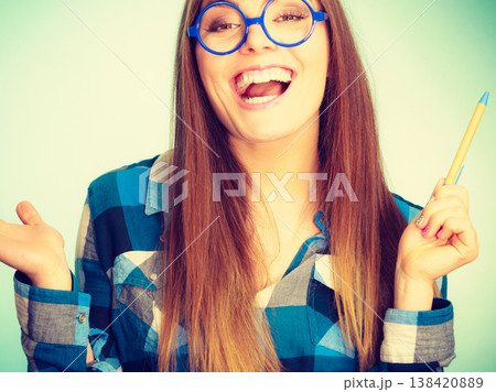 Happy smiling nerdy woman in weird glasses 138420889