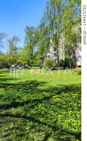 Modern cityscape with natural green spaces in springtime. Ideal for eco-friendly visuals, tourism imagery, and editorial design. Modern cityscape with natural green spaces in springtime. Ideal for eco-friendly visuals, tourism imagery, and editorial design. 138423781