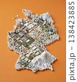 Miniature cityscape shaped as Germany map on flat background - ai generated 138423885