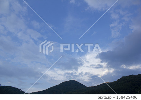 Blue sky and mountain silhouette Blue sky and mountain silhouette 138425406