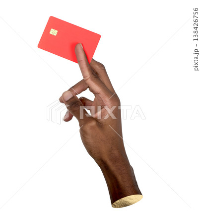 Close-up of a male hand holding a red credit or debit card, shown for cashless payment and shopping. Close-up of a male hand holding a red credit or debit card, shown for cashless payment and shopping. 138426756