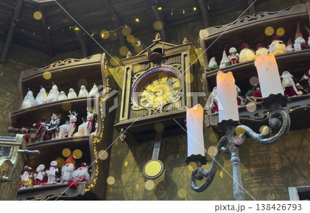 Golden clock symbolizing New Year countdown and festive celebration at midnight. Holiday decoration Golden clock symbolizing New Year countdown and festive celebration at midnight. Holiday decoration 138426793
