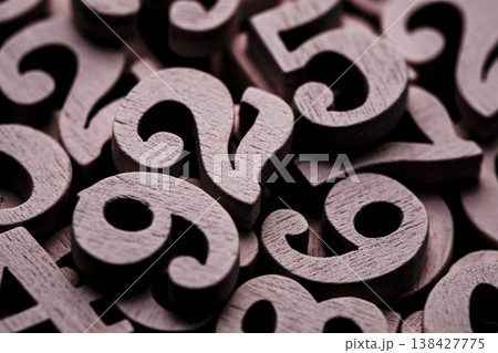 Pile of old wooden numbers in vintage style. Mathematics, education and learning concept. 138427775