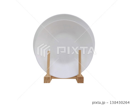 A clean dish rack sits on the white floor. A clean dish rack sits on the white floor. 138430264