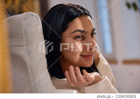 Woman wearing under eye patches looking at camera. Woman wearing under eye patches looking at camera. 138430801