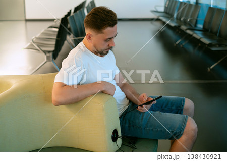 Charging devices in airport seat a convenient solution for modern travelers who value technology mobility and constant connection 138430921