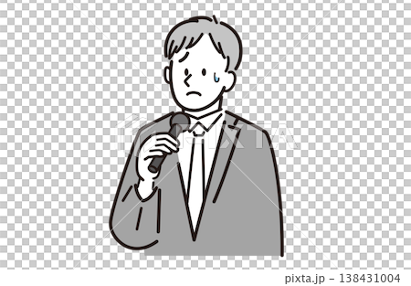 マイクを持って困っているスーツを着た男性 138431004