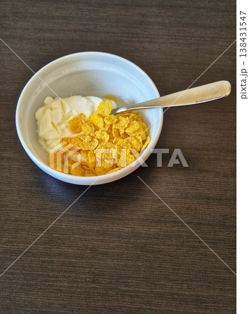 yogurt with cereal in a bowl. close-up delicious breakfast yogurt with cereal in a bowl. close-up delicious breakfast 138431547