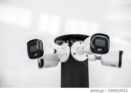 Circuit Television cameras on a black pole isolated on white background for surveillance outdoor security systems, safety. Circuit Television cameras on a black pole isolated on white background for surveillance outdoor security systems, safety. 138432012