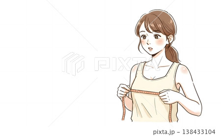 自宅でメジャーを使ってバストサイズを測る女性 138433104