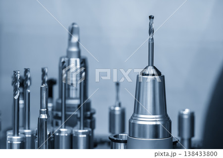 Precision drill tool setup with professional tool holder for a high-speed CNC milling machine. Precision drill tool setup with professional tool holder for a high-speed CNC milling machine. 138433800