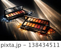 Luxurious eyeshadow palettes with shimmering powders and dramatic lighting 138434511