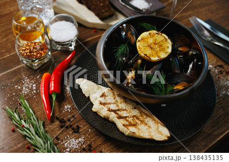 Artisan mussels with dill and grilled bread Artisan mussels with dill and grilled bread 138435135