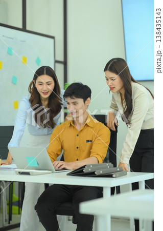 Corporate team celebrating successful business results 138435143