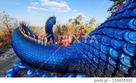 Giant Blue Naga Serpent Statue at Phu Manorom Temple, Mukdahan Thailand Giant Blue Naga Serpent Statue at Phu Manorom Temple, Mukdahan Thailand 138435391