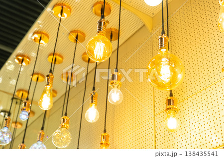 Showcase of retro glass lamps, vintage shaped bulbs, shop interior lighting, designer illumination display, creative home decor, ceiling trend accent. 138435541