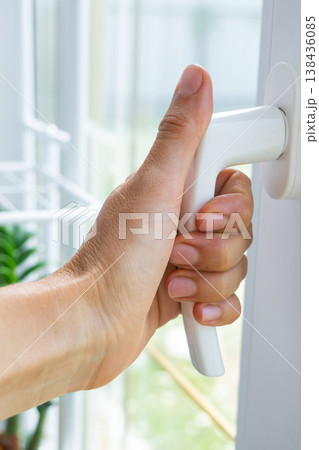 PVC window handle for opening and closing sash, easy adjustment of noise-insulating hardware, installation for safety, protection, draft, and comfort. PVC window handle for opening and closing sash, easy adjustment of noise-insulating hardware, installation for safety, protection, draft, and comfort. 138436085