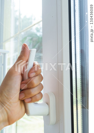 Opening sash of plastic window, adjusting for ventilation and comfort, premium fittings, protection from draft, window installation business, noise barrier. Opening sash of plastic window, adjusting for ventilation and comfort, premium fittings, protection from draft, window installation business, noise barrier. 138436089