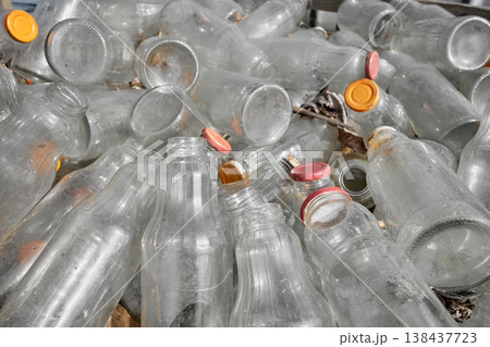 Used glass containers intended for recycling, selective focus. Used glass containers intended for recycling, selective focus. 138437723