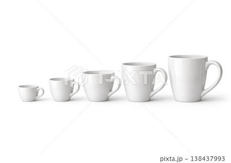 Five white cups of different sizes on a light background. Space for text. 138437993