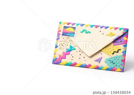 Decorative postal envelope with a stamp on a light background. Space for text. 138438034