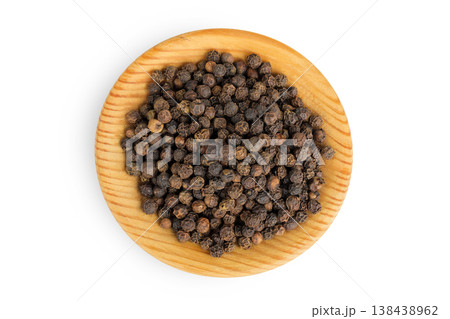 Black peppercorns or pepper in a wooden bowl isolated on a white background. Top view. Flat lay Black peppercorns or pepper in a wooden bowl isolated on a white background. Top view. Flat lay 138438962