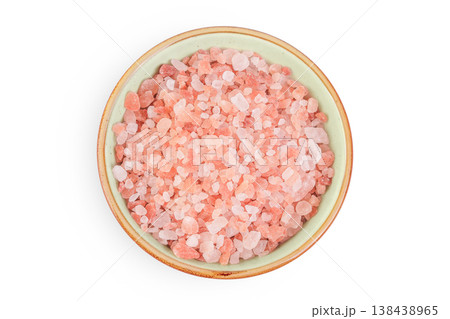 Pink Himalayan salt in ceramic bowl isolated on white background. Top view. 138438965