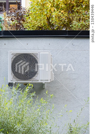 air conditioning on facade of building, air cooling in hot weather.  138439446