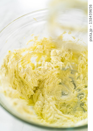 Close-up of a creamy and smooth cream cheese mixture combined with wasabi, perfectly whipped for the smoked salmon rolls. 138439656