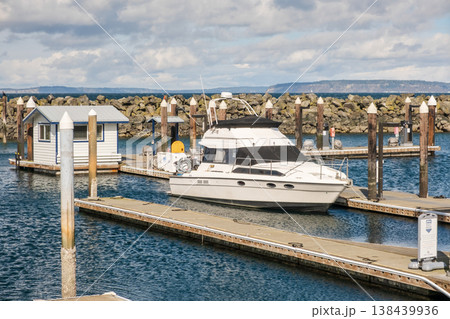 Edmonds, Marina Beach Park, WA, 03.13.2025 - a boat moored at the pier Edmonds, Marina Beach Park, WA, 03.13.2025 - a boat moored at the pier 138439936