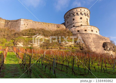 Marienberg Fortress tower above vineyard hillside in Wurzburg, Germany 138440862