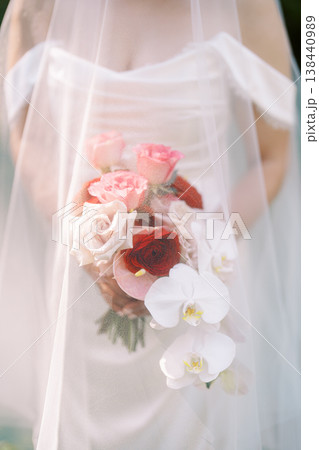 An Elegant Cascade Of Pastel Roses And Fragrant Orchids An Elegant Cascade Of Pastel Roses And Fragrant Orchids 138440989