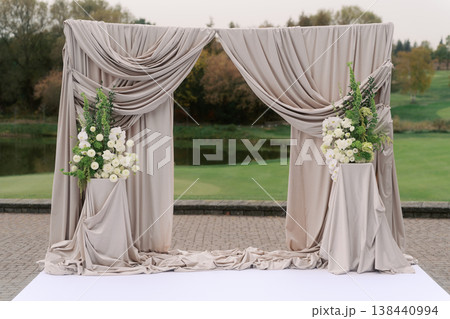 Elegant Floral Archway Enhances Romantic Garden Ambiance 138440994