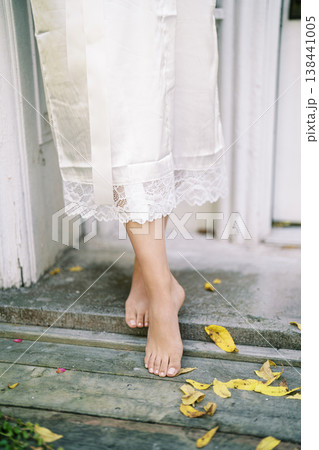 Barefoot Bride Makes Her Way Up Steps With Grace And Serenity Barefoot Bride Makes Her Way Up Steps With Grace And Serenity 138441005