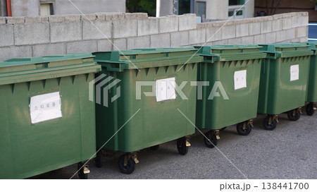 Green waste bins lined up outdoors in Seoul, South Korea Green waste bins lined up outdoors in Seoul, South Korea 138441700