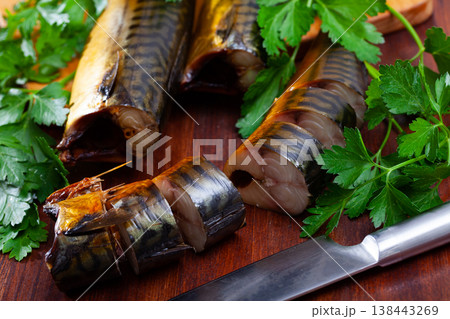 Slices of smoked mackerel served with greens Slices of smoked mackerel served with greens 138443269