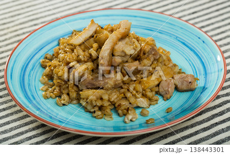 Barley porridge with pork roast is tasty tradition of Christmas Barley porridge with pork roast is tasty tradition of Christmas 138443301