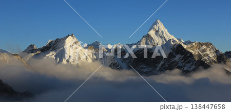 Mount Ama Dablam and sea of fog, Nepal. Mount Ama Dablam and sea of fog, Nepal. 138447658