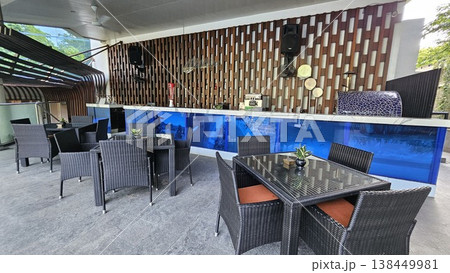 tables and chairs in restaurant 138449981