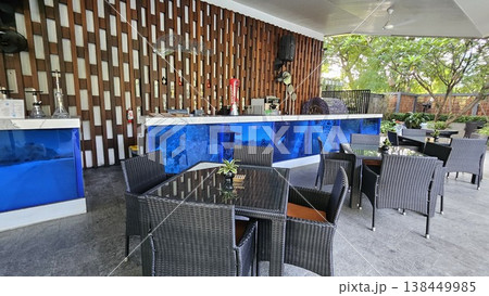 tables and chairs in restaurant 138449985