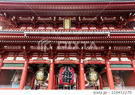 Building view of the Hozomon of Kinryu-zan Senso-ji in Asakusa, Tokyo, Japan. The gate hung with three large lanterns displayed the Nio statues on both sides. 138452270